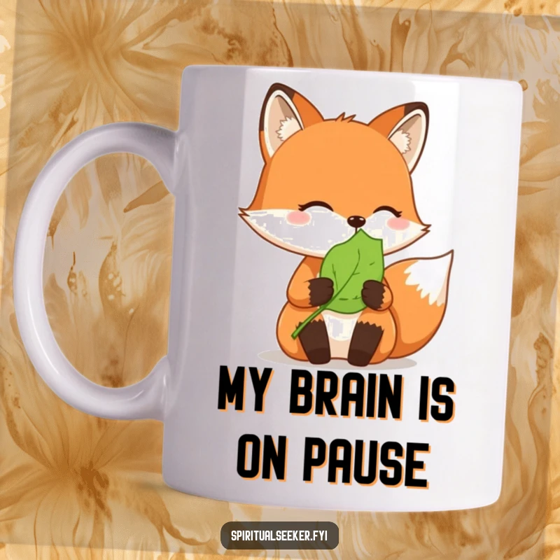 Funny mug: A thoughtful fox gently holds a peaceful green leaf, embodying calm and nature.