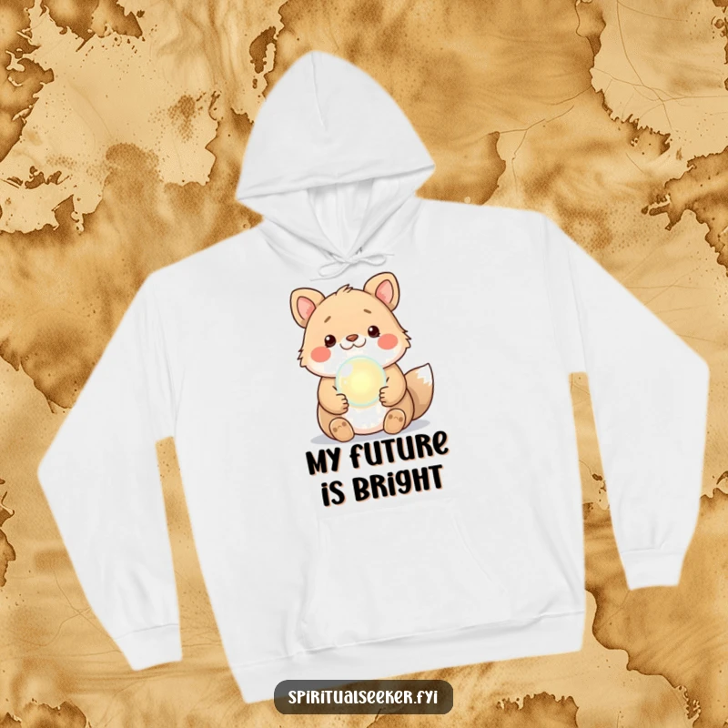 Funny Kawaii Animal Hoodie clutching a shimmering crystal ball, offering humorous psychic readings, a perfect cozy gift.