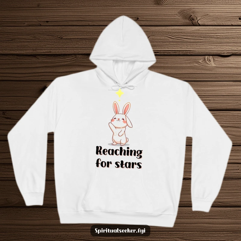 Funny hopeful rabbit hoodie, reaching towards a glowing constellation, providing comfort and inspiration.
